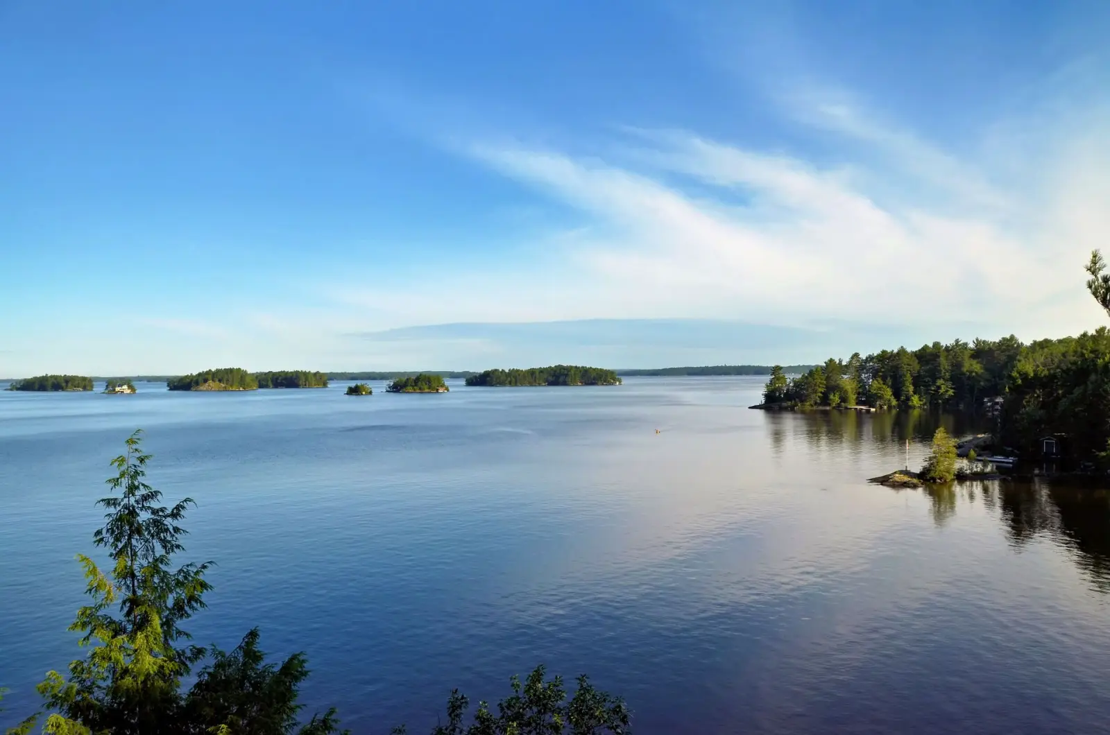 Panoramic view of Muskoka Lakes with forested islands in Ontario's cottage country